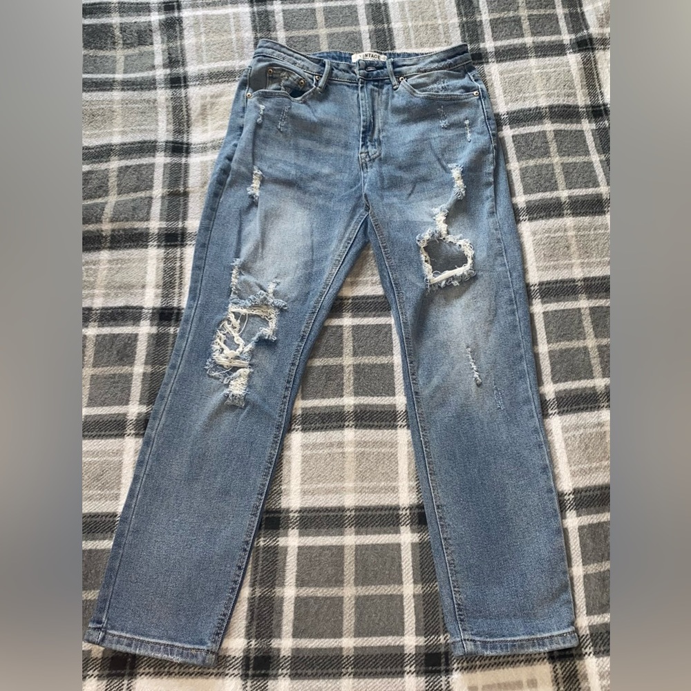 Almost Famous denim mom jeans a fashionable high rise and rips